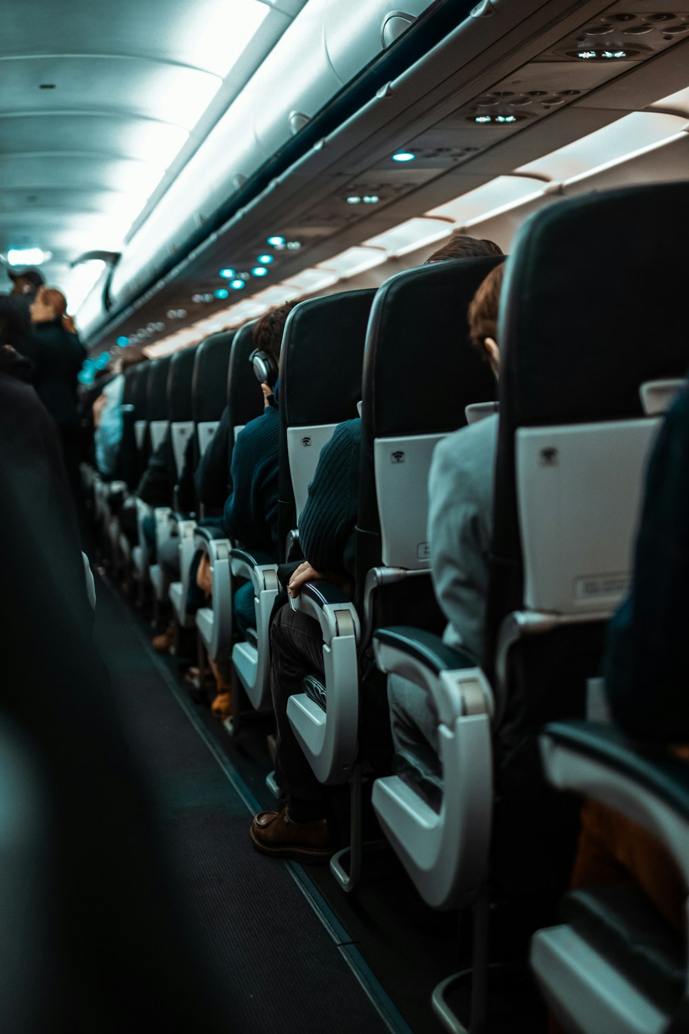 people sitting on gray seats