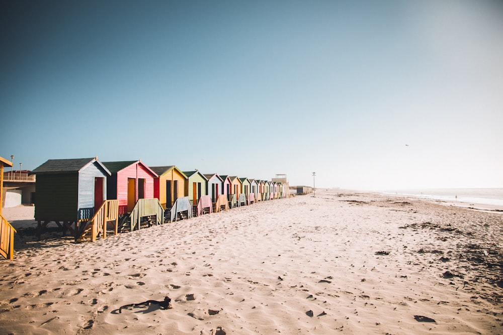 houses on beach during daytime