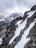 Wide shot of the rugged mountains in northern Pakistan under a cloudy sky.