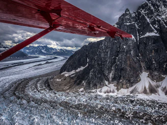 An adventurous group enjoying a scenic flight over majestic glaciers