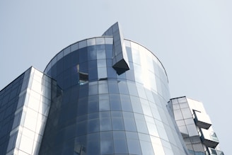 gray concrete building under white sky during daytime