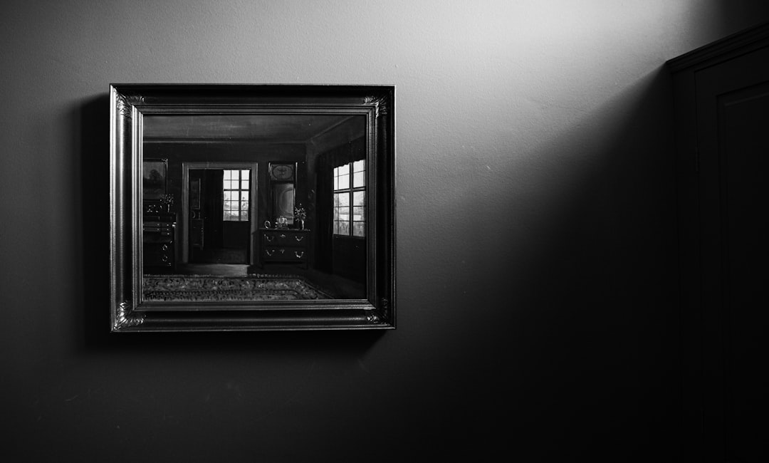 black wooden window frame on white wall