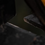 Surgical steel instrument on a dark textured surface