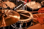 brown and black drum set