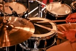 brown and black drum set