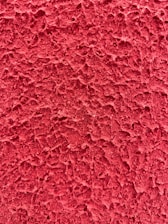 red textile in close up photography