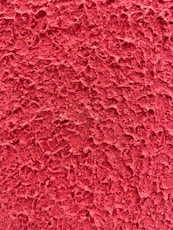 red textile in close up photography