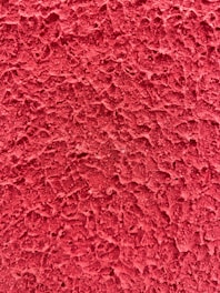 red textile in close up photography