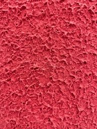 red textile in close up photography