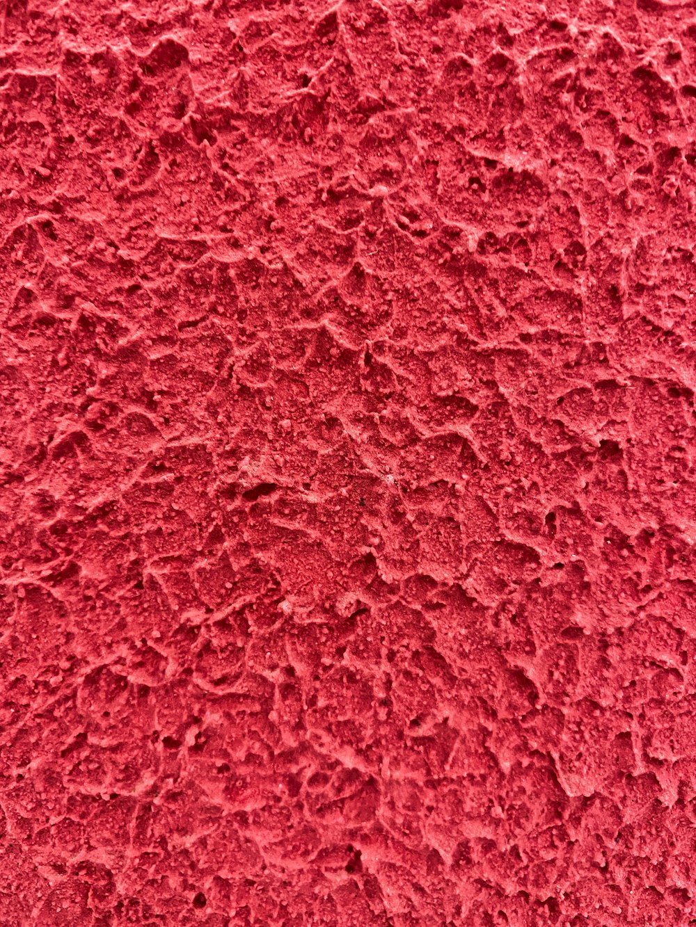 red textile in close up photography