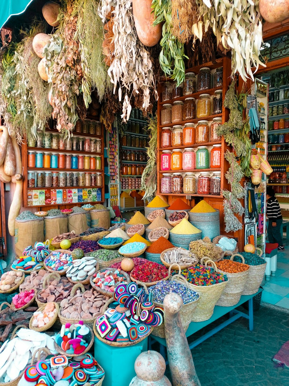 assorted color of wicker baskets on display