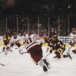 ice hockey players on ice hockey stadium