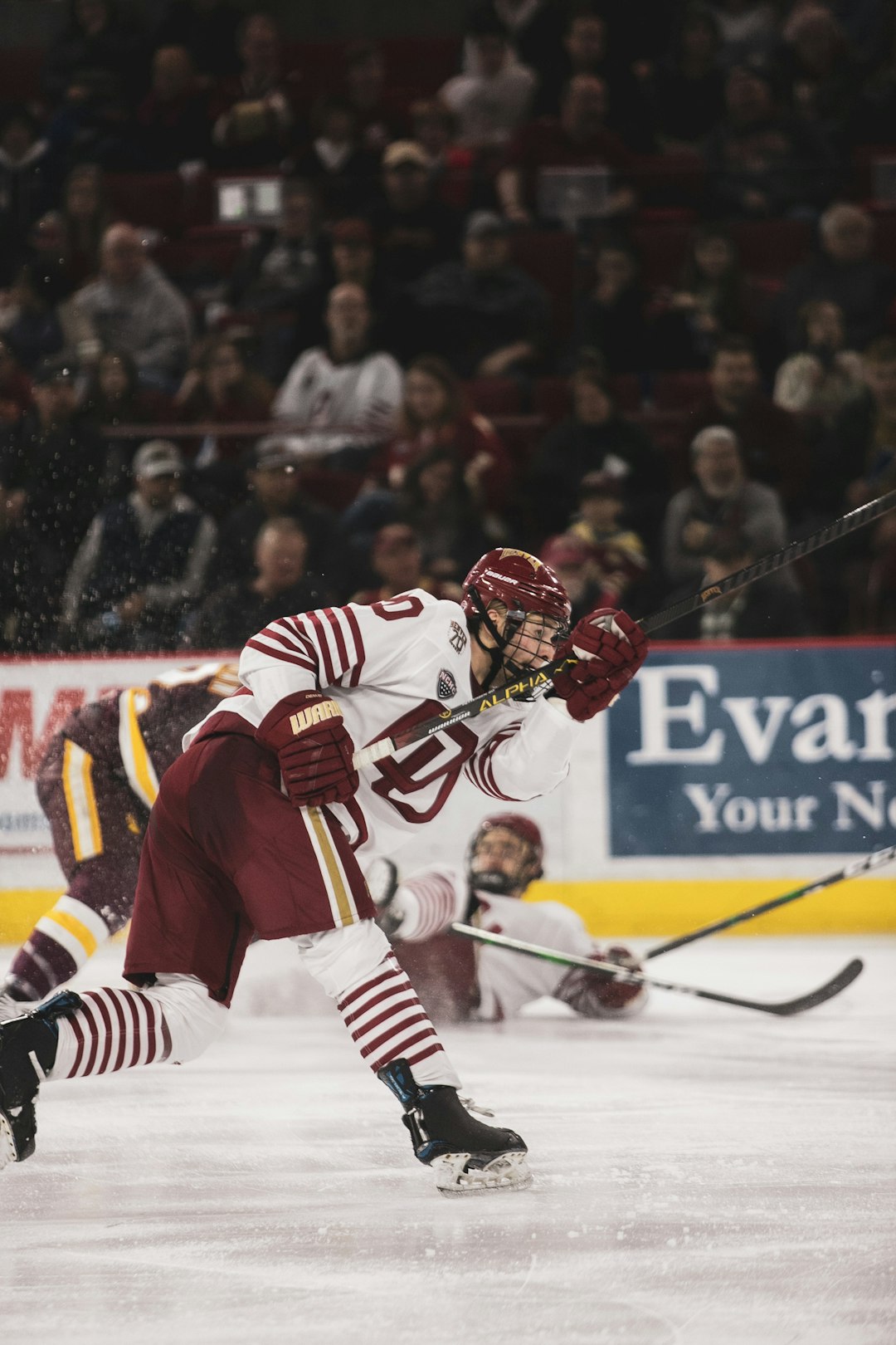 ice hockey players on ice hockey field