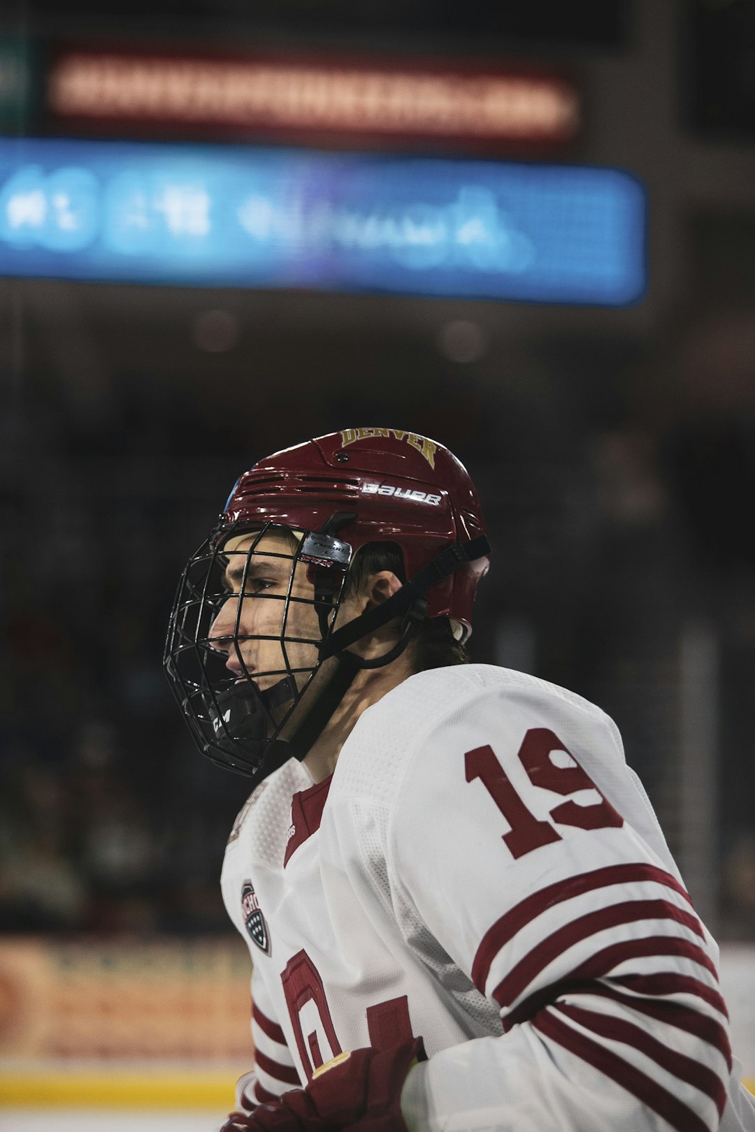 man in white and red jersey shirt wearing red helmet