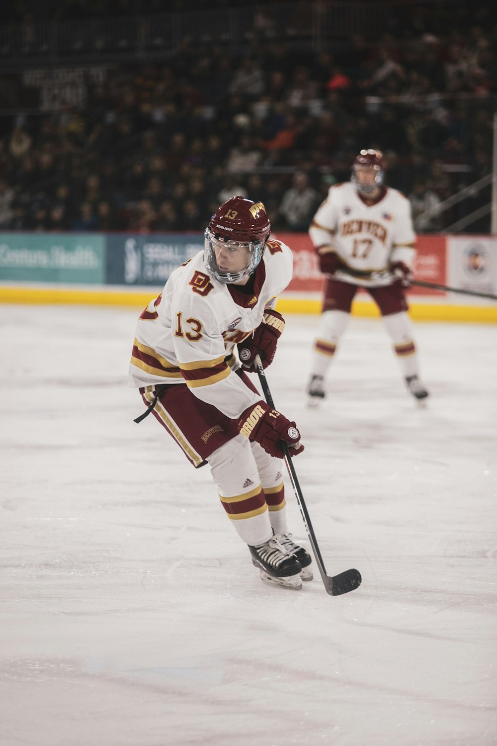 ice hockey players on ice hockey field