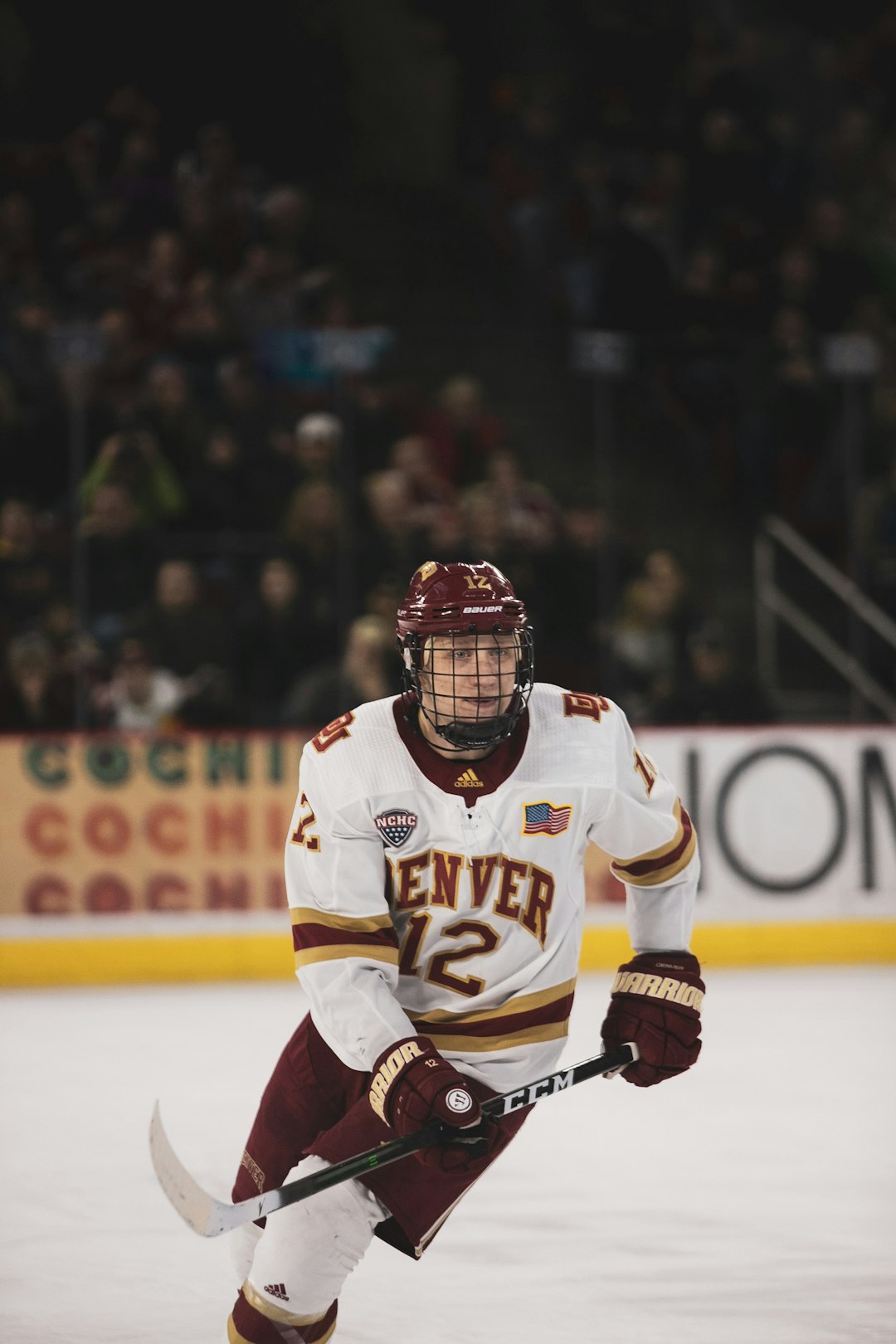 man in white and black ice hockey jersey