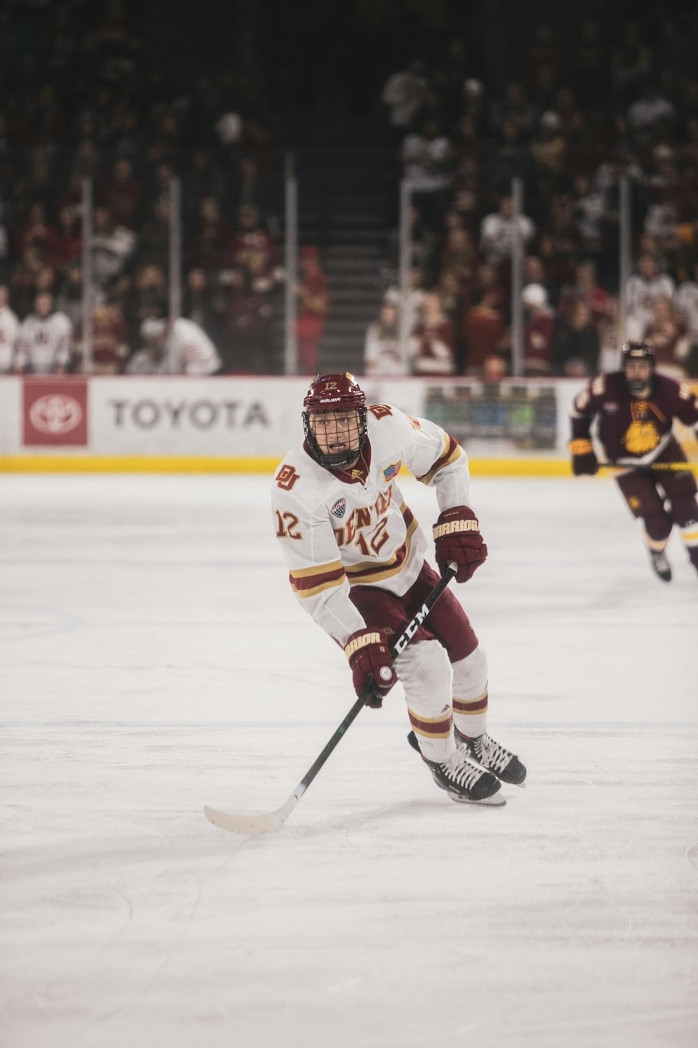 ice hockey players on ice hockey field