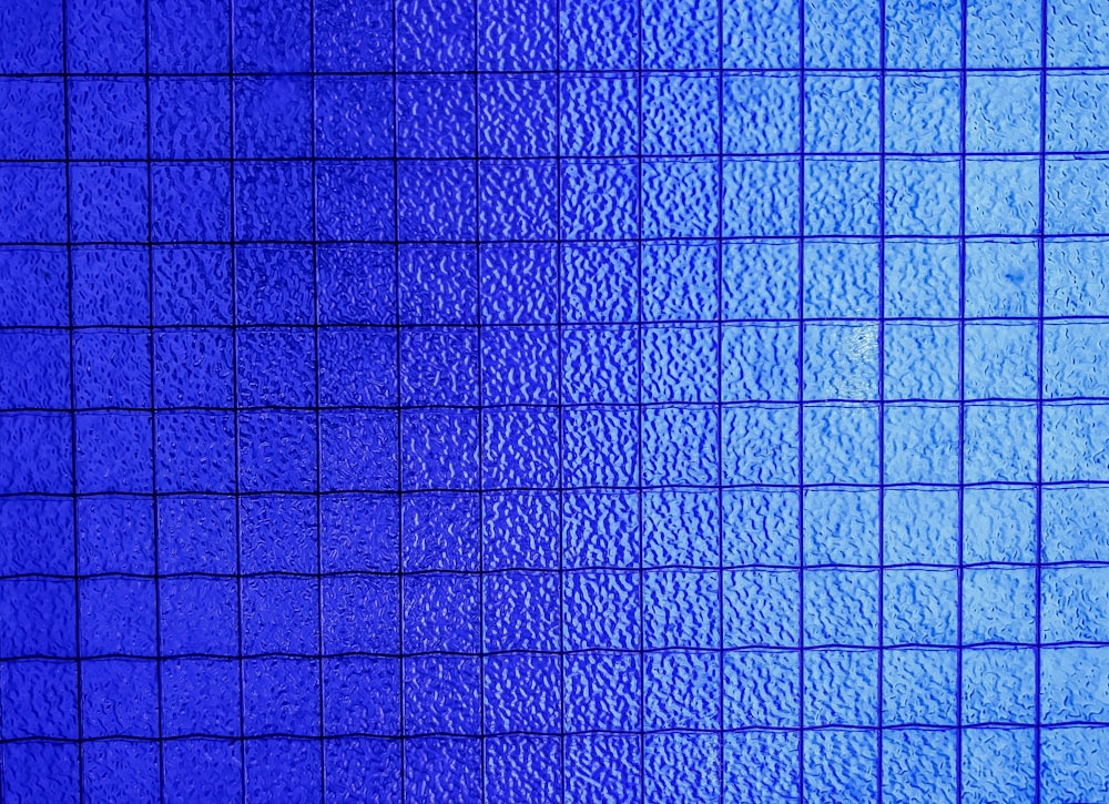 blue and yellow checkered textile