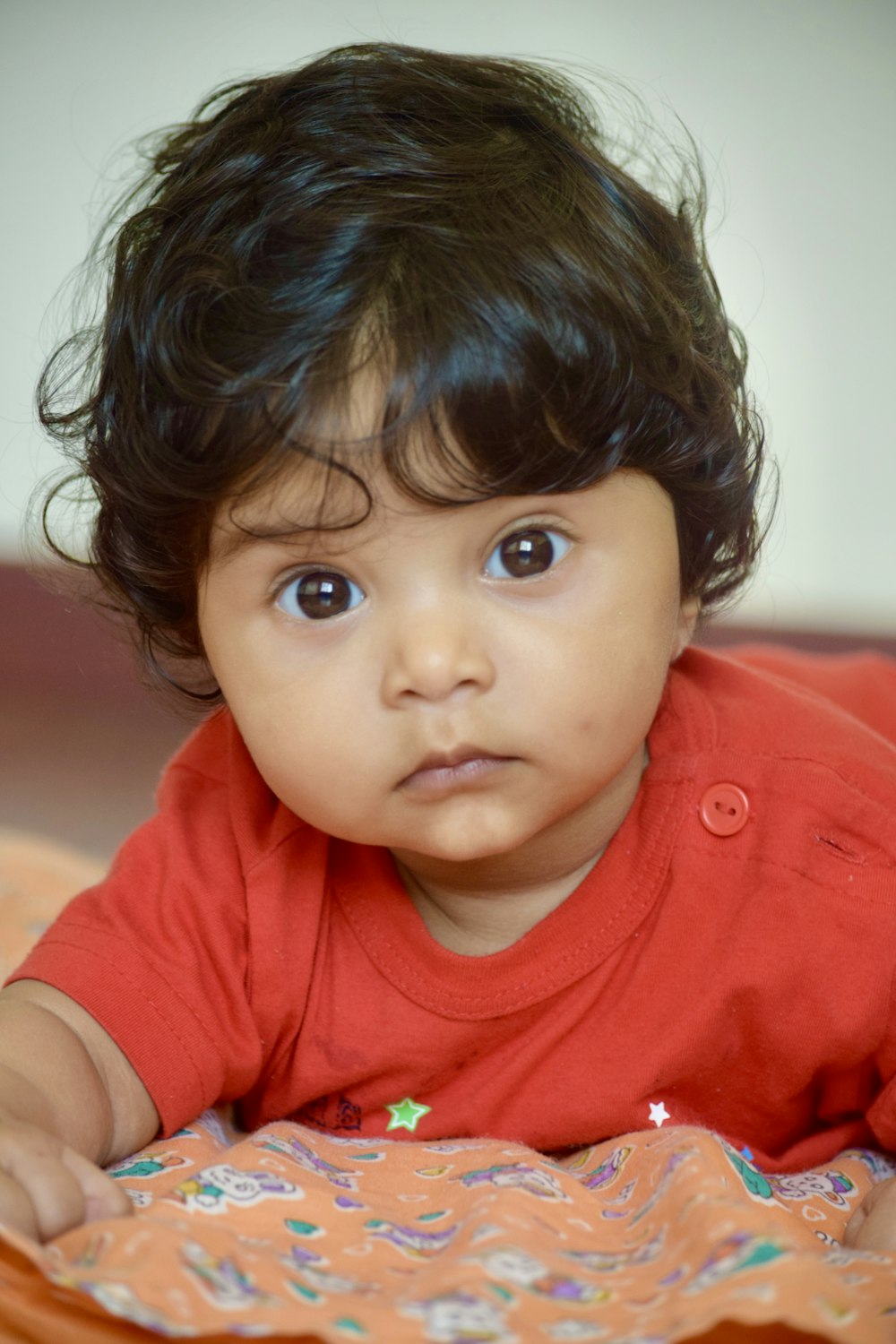 boy in red polo shirt