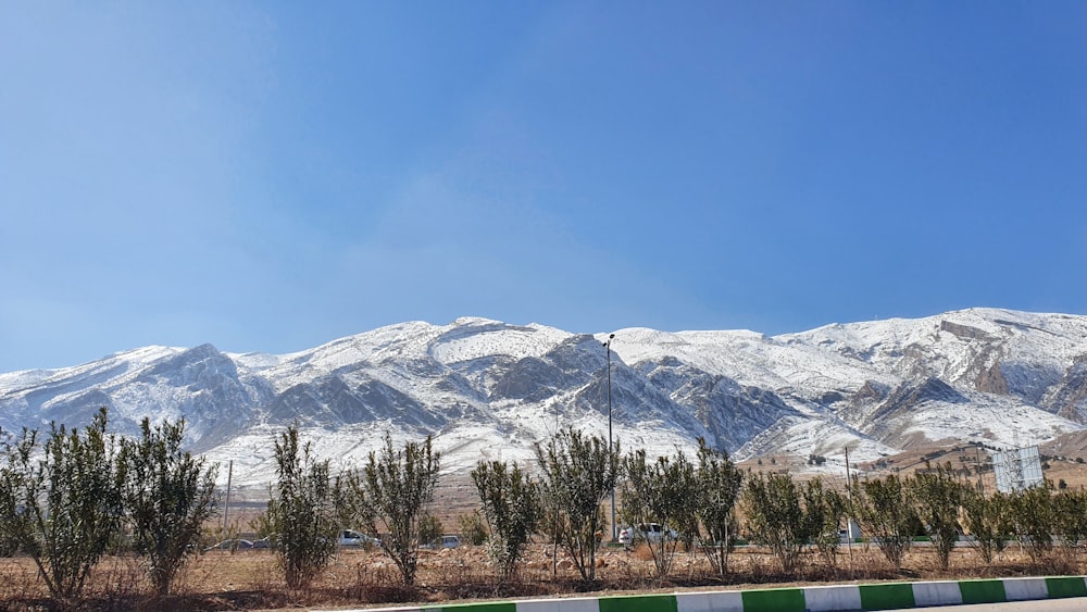 snow covered mountain under blue sky during daytime