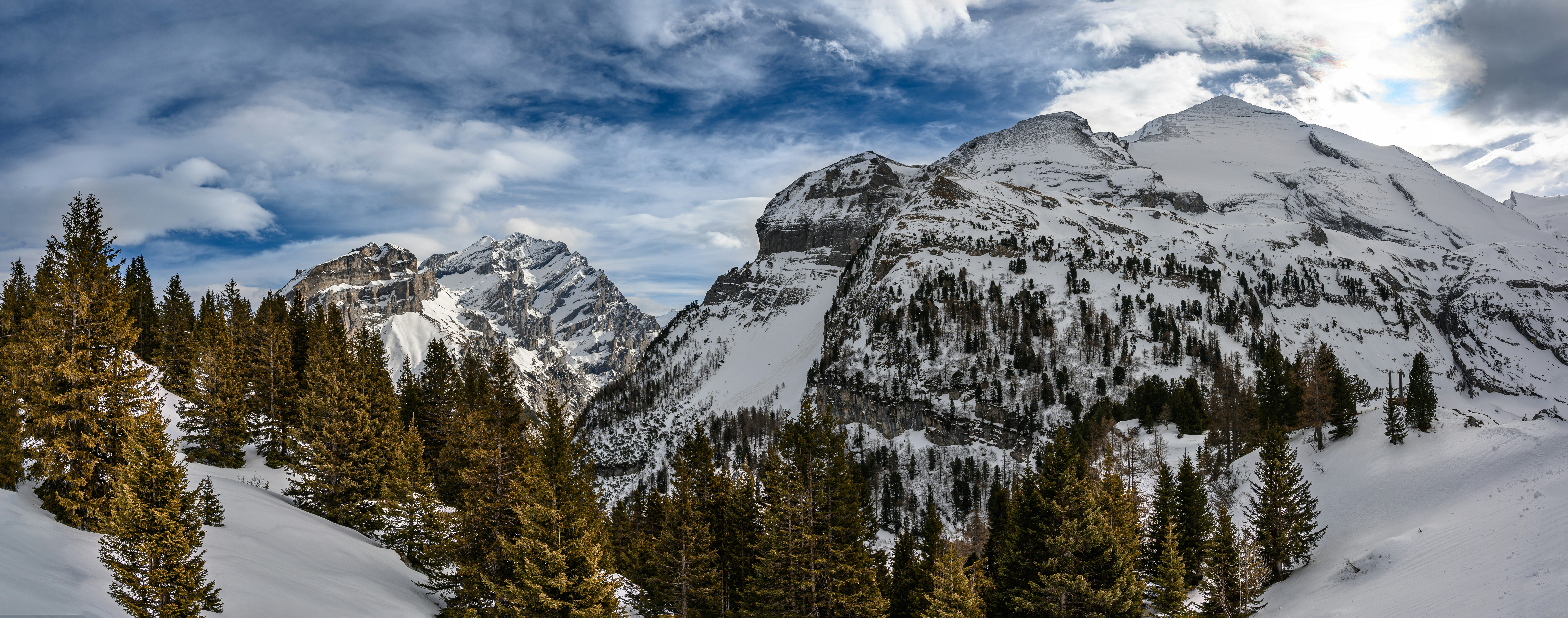 snow covered mountain under blue sky during daytime