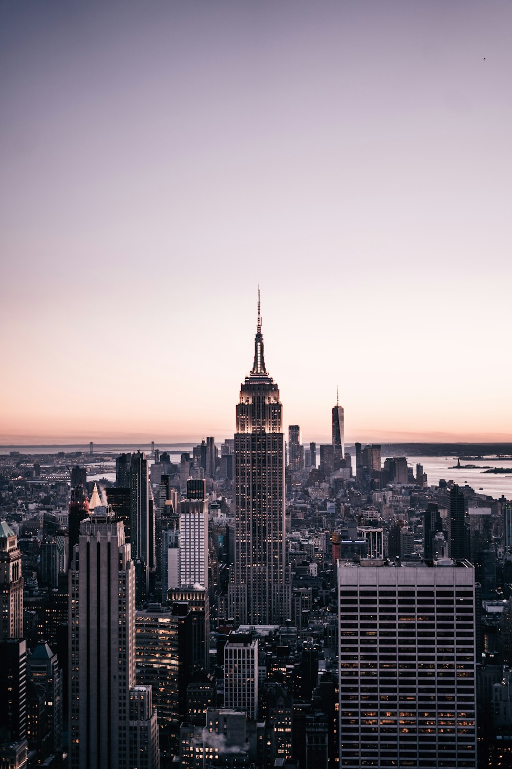 city skyline during sunset with city skyline in the distance