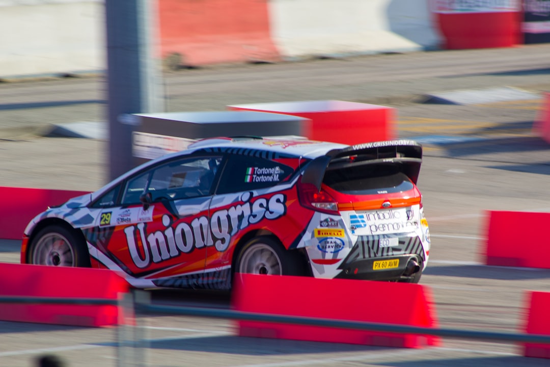 blue and red race car on track