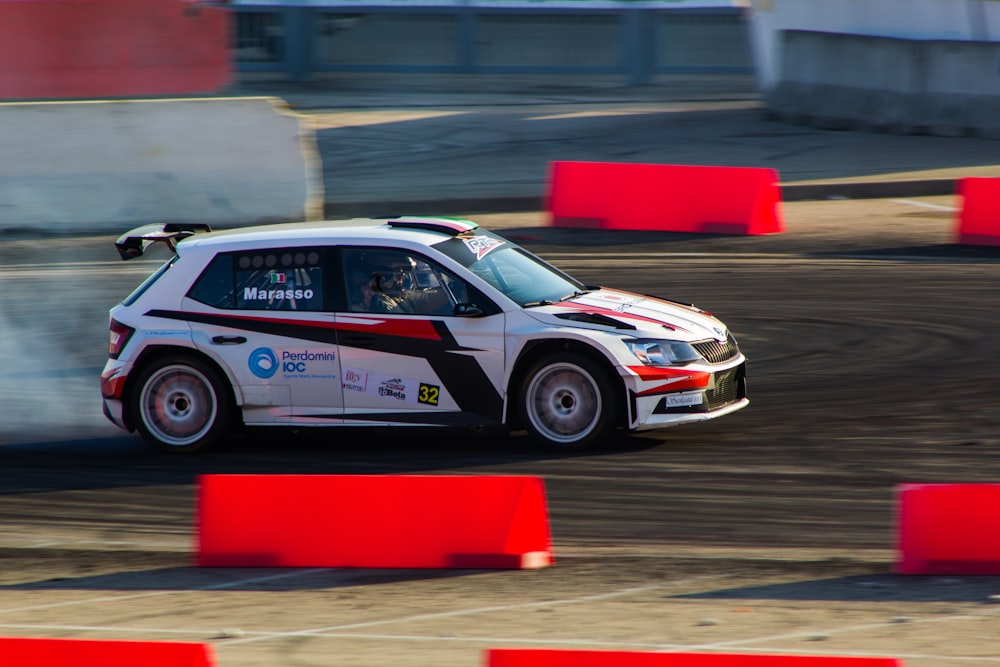 red and black porsche 911 on track