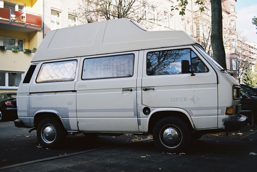 white van parked on the side of the road