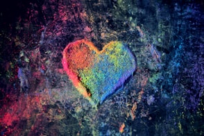 green and red heart shaped textile