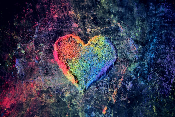 green and red heart shaped textile