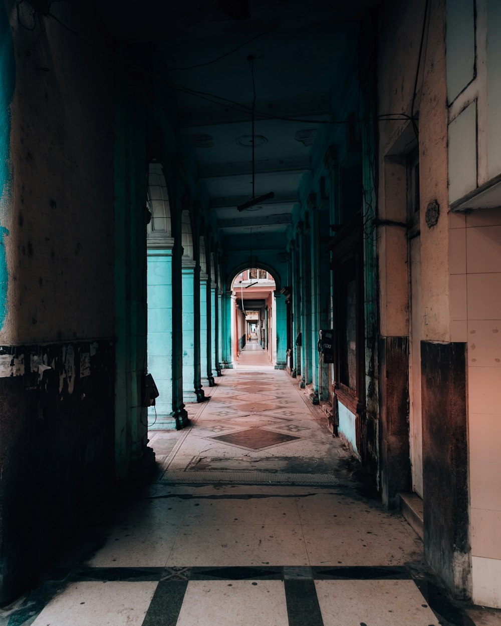 empty hallway with red columns