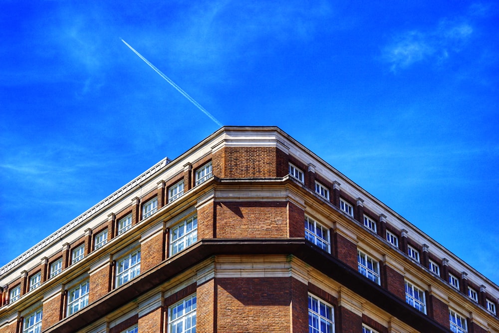 brown concrete building under blue sky during daytime