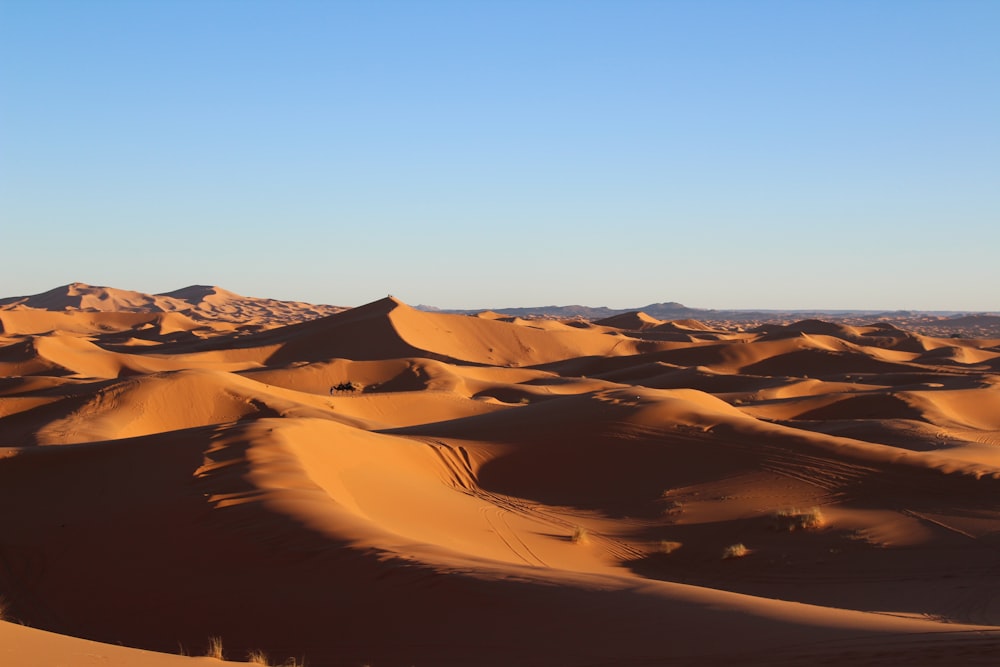 brown mountain under blue sky during daytime