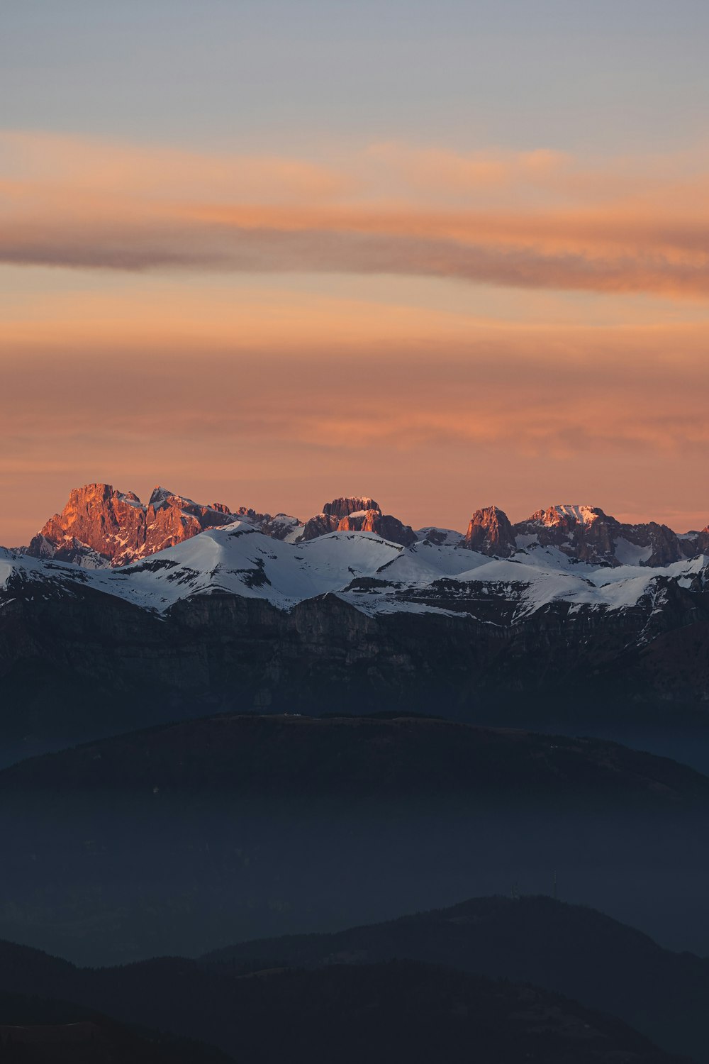 snow covered mountain during daytime