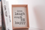 brown wooden frame with quote