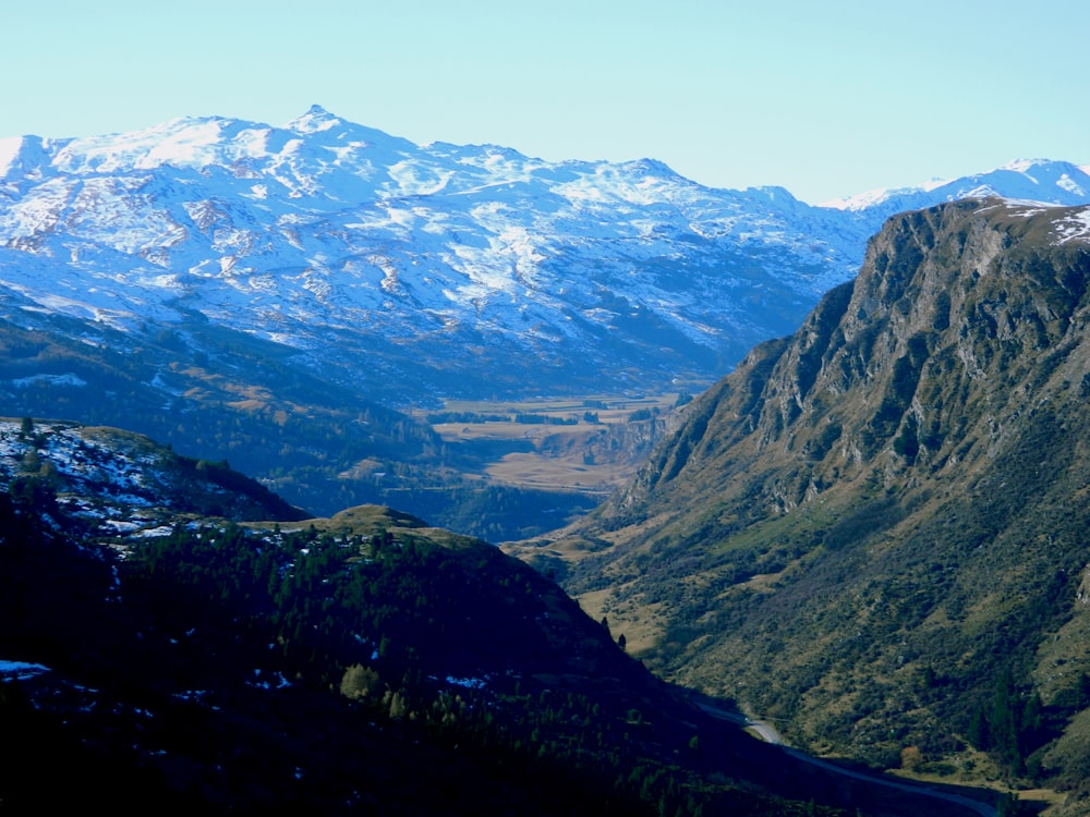 green and brown mountains under blue sky during daytime