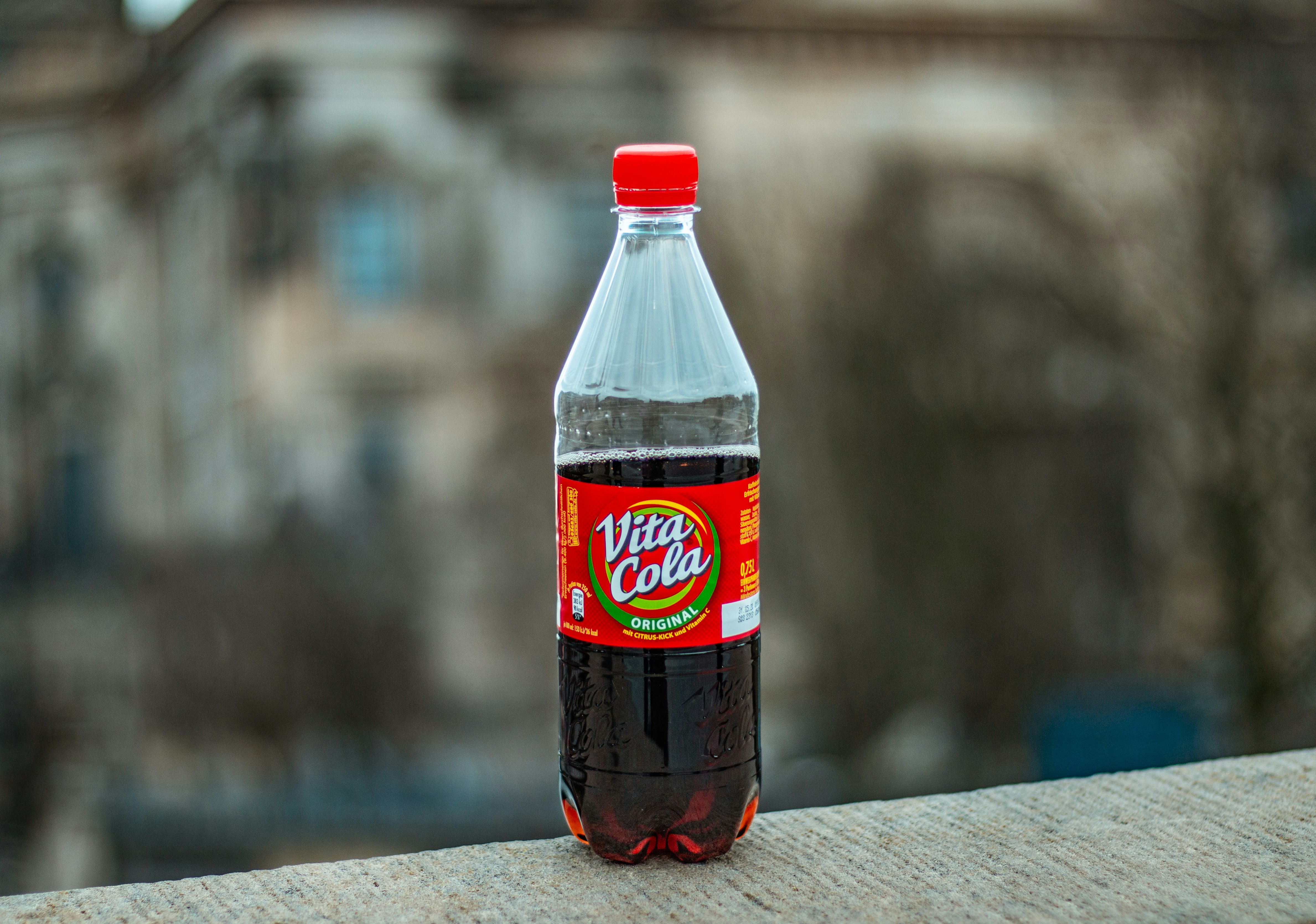 dr pepper bottle on brown wooden table