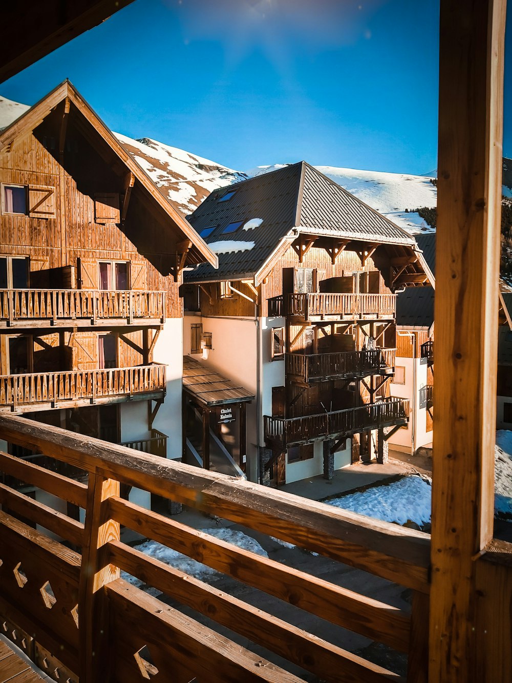 brown wooden houses under blue sky during daytime