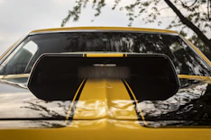A sleek hoodscoop installed on a car.