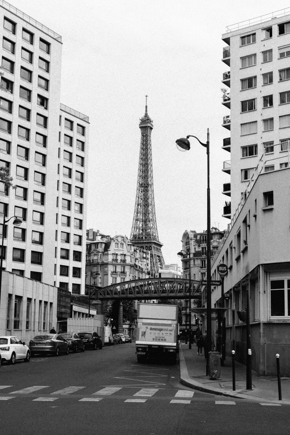 grayscale photo of city buildings