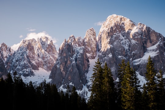 snow covered mountain during daytime in Dolomiti di Brenta Italy