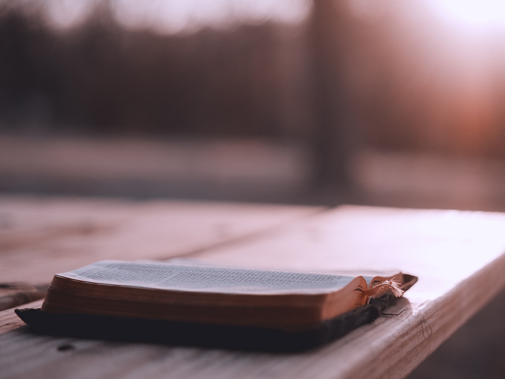 brown wooden board on brown wooden table