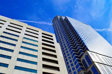 white and blue concrete building under blue sky during daytime