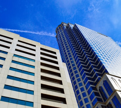 white and blue concrete building under blue sky during daytime