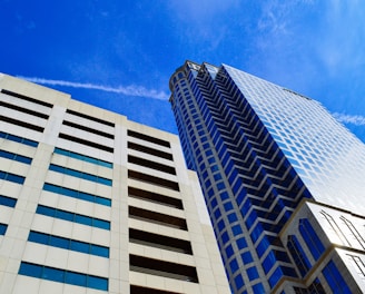 white and blue concrete building under blue sky during daytime