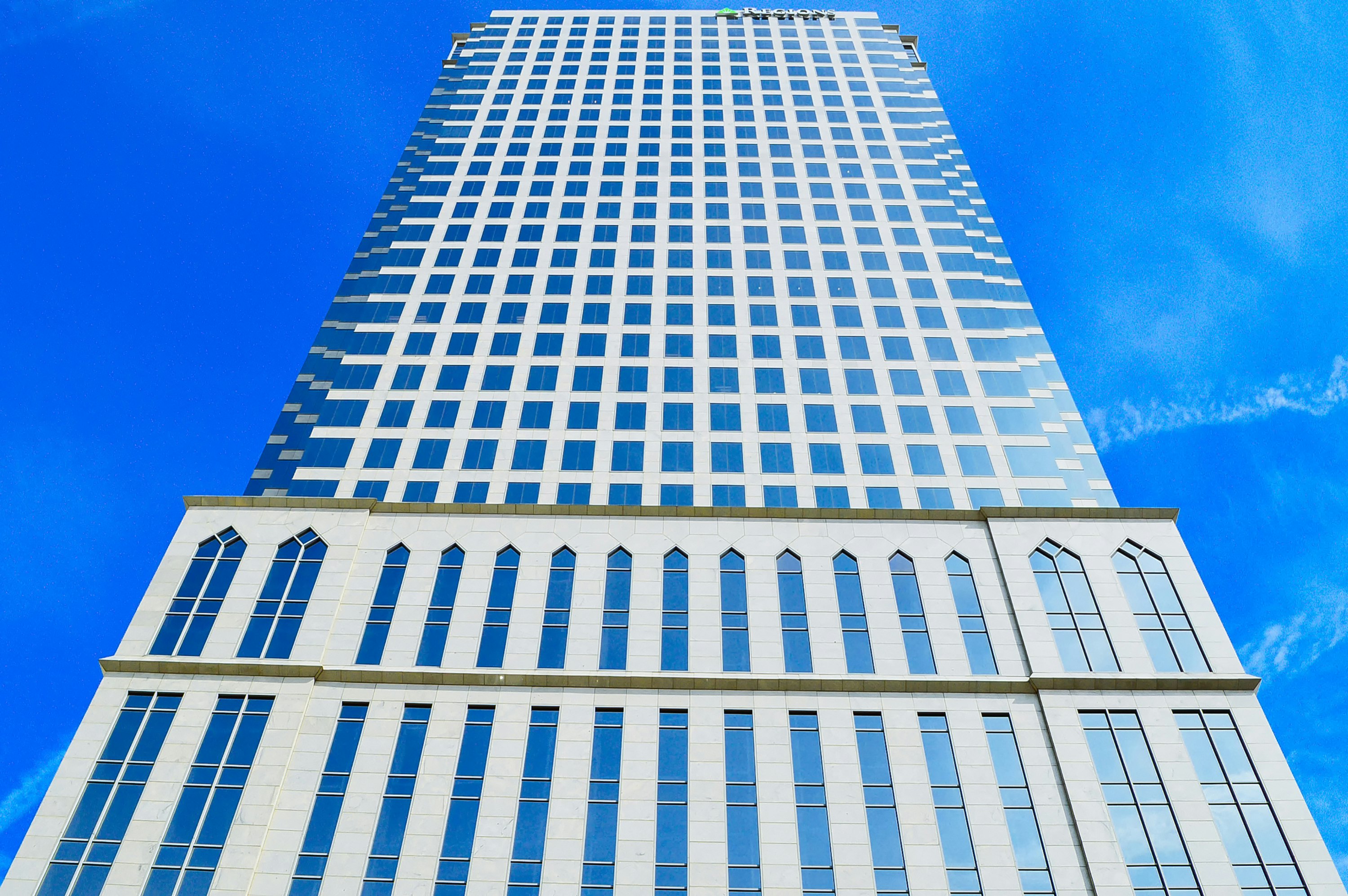 white and blue high rise building