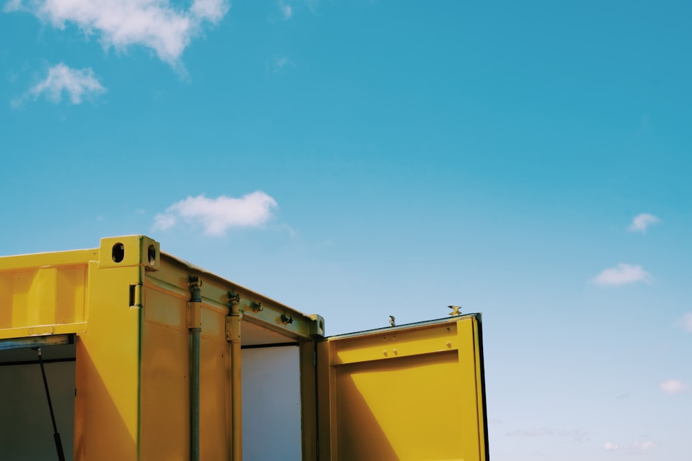 yellow and white building under blue sky during daytime