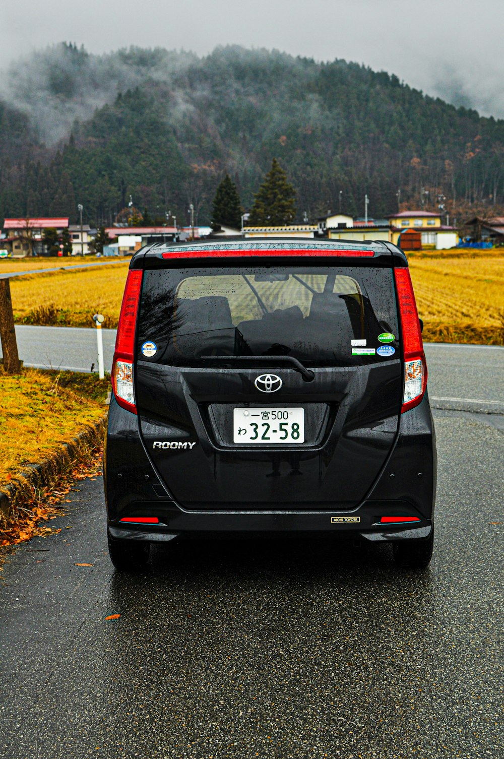 black honda car on road during daytime