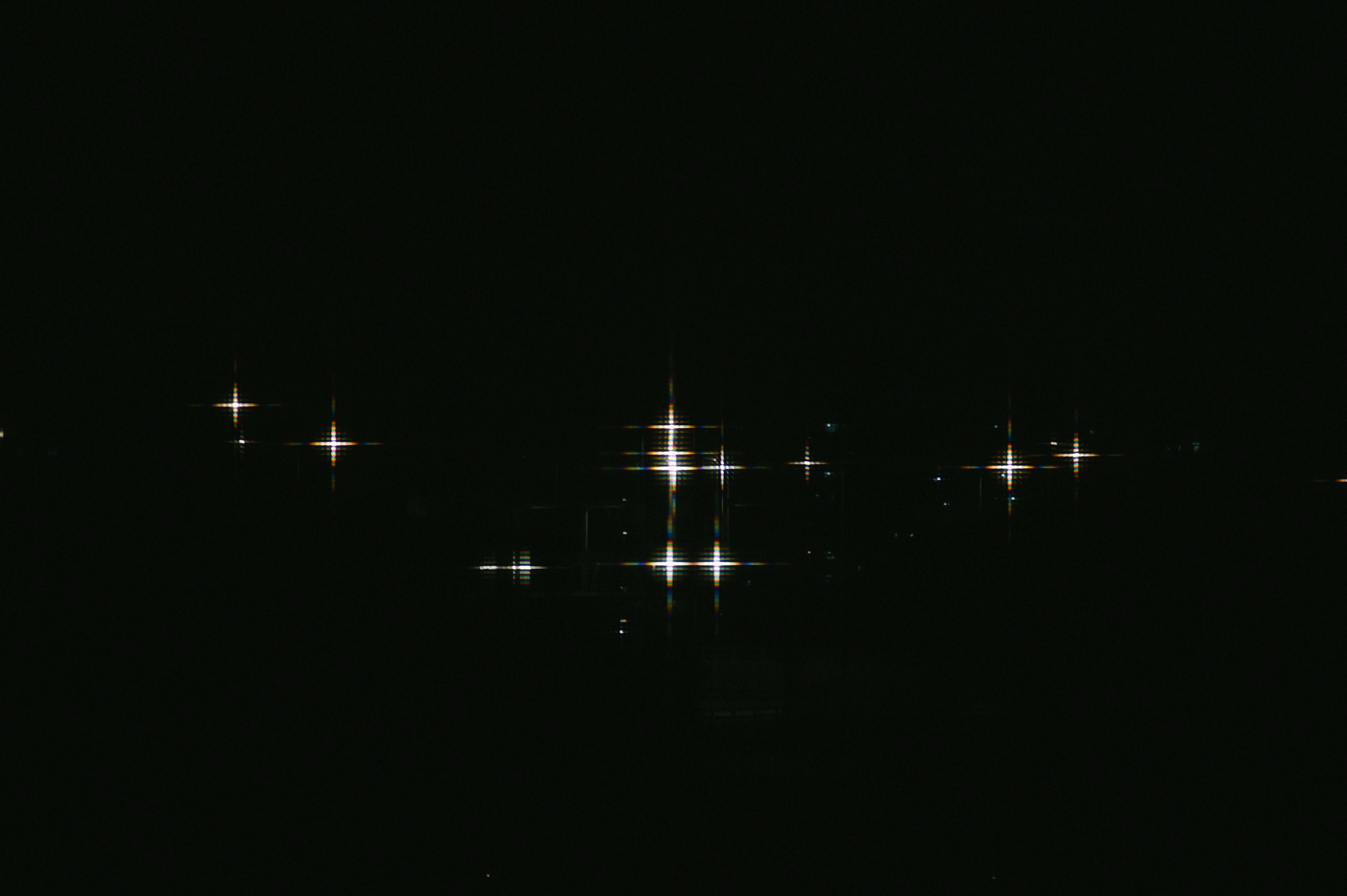 white and blue light on a dark place